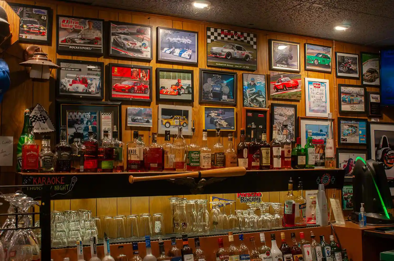 View Behind Bar with Signed Race Photos